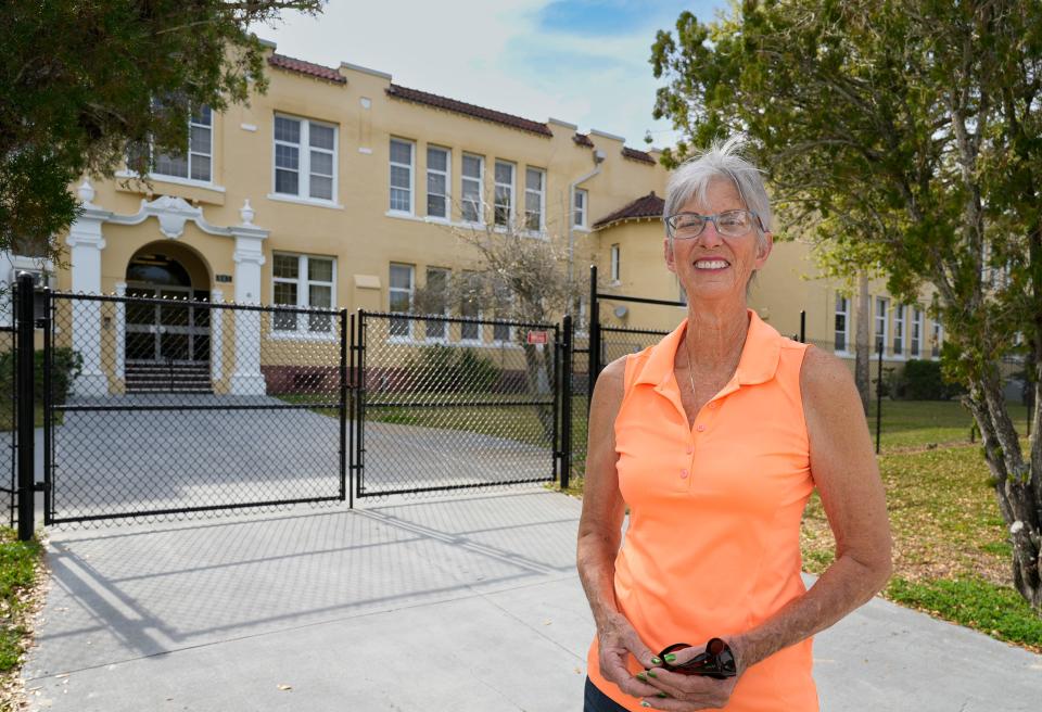 Tracey Remark outside of the Riverview Learning Center in Daytona Beach, Wednesday, March 6, 2024. The school board voted to move the alternative education program from Riverview to the Osceola Elementary campus in Ormond Beach next year. Neighbors are concerned about the building's future.