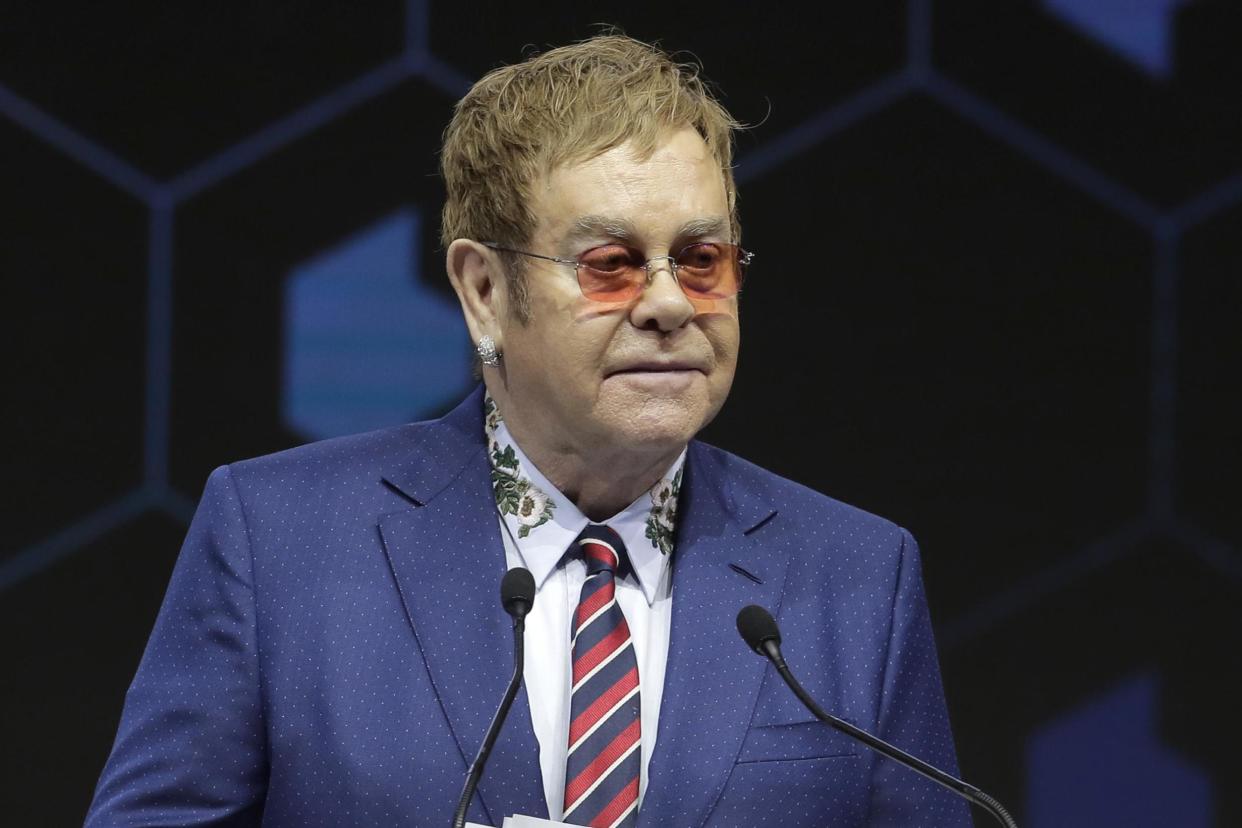 Elton John spoke at the Crystal Awards ceremony on the eve of the World Economic Forum in Davos: AP