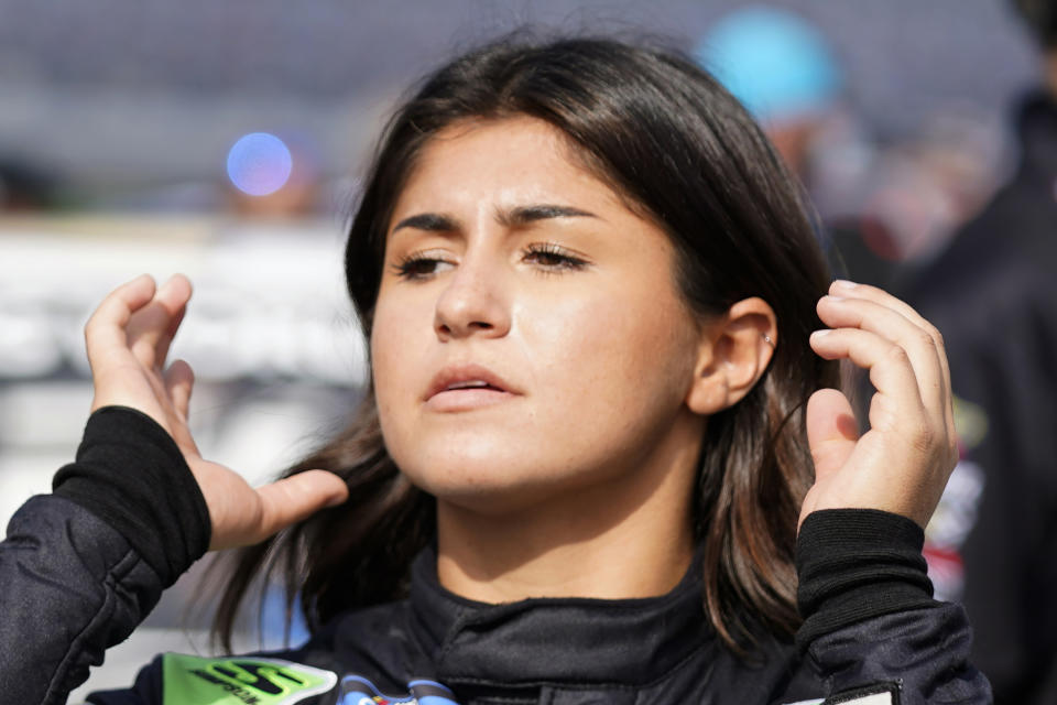 FILE - Hailie Deegan waits on pit road during NASCAR truck qualifying at Daytona International Speedway in Daytona Beach, Fla., in this Friday, Feb. 12, 2021, file photo. Tony Stewart was like everyone else in the motorsports industry this week, frequently checking social media to see Paul Tracy's latest theatrics in a one-sided war against NASCAR golden girl Hailie Deegan. (AP Photo/John Raoux, File)
