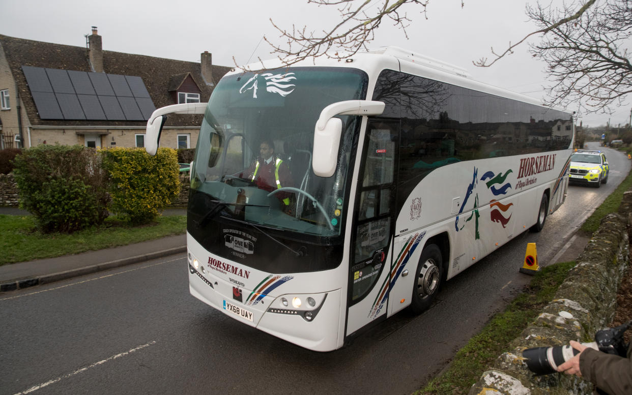 Coaches leave Brize Norton, Oxfordshire, carrying passengers from a plane which transported British nationals from the coronavirus-hit city of Wuhan in China. (PA)