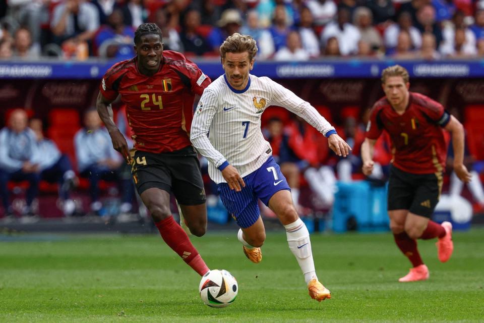 Antoine Griezmann is flanked by Amadou Onana at Euro 2024 (AFP via Getty Images)