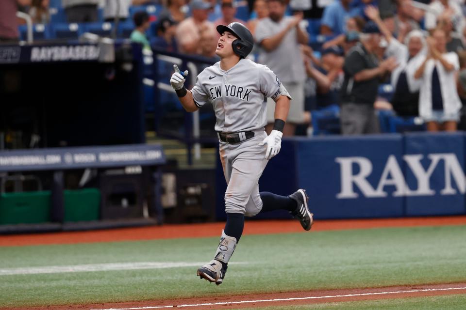 New York Yankees' Anthony Volpe reacts after hitting a home run against the Tampa Bay Rays during the fourth inning of a baseball game Sunday, Aug. 27, 2023, in St. Petersburg, Fla. (AP Photo/Scott Audette)