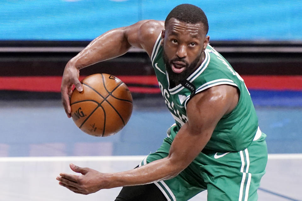 FILE - In this May 25, 2021, file photo, Boston Celtics guard Kemba Walker (8) looks for an outlet during the first quarter of Game 2 of an NBA basketball first-round playoff series against the Brooklyn Nets in New York. The Celtics traded Walker to Oklahoma City for forward Al Horford, a person with knowledge of the deal told The Associated Press on Friday, June 18, 2021. (AP Photo/Kathy Willens, File)
