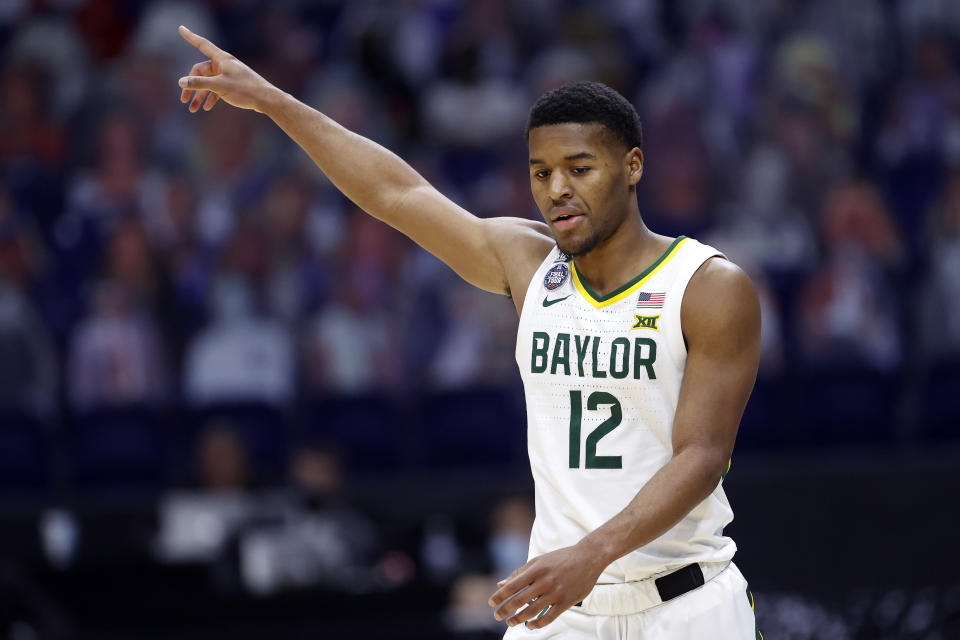 INDIANAPOLIS, INDIANA - APRIL 03: Jared Butler #12 of the Baylor Bears reacts in the second half against the Houston Cougars during the 2021 NCAA Final Four semifinal at Lucas Oil Stadium on April 03, 2021 in Indianapolis, Indiana. (Photo by Jamie Squire/Getty Images)