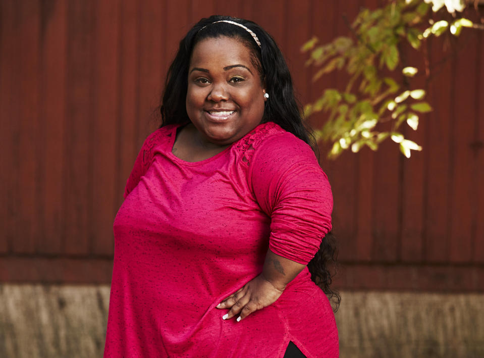 This image released by Lifetime shows Ashley "Ms. Minnie" Ross of the Atlanta-filmed reality TV show “Little Women: Atlanta.” Ross died in a Georgia car crash on Monday, April 27, her representative confirmed Tuesday. The Lifetime series follows the lives of a group of women with dwarfism trying to make it big in Atlanta’s hip-hop and rap music scene. (Lifetime via AP)