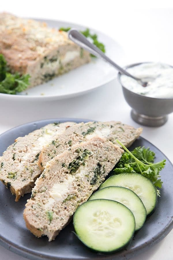 Feta-Stuffed Turkey Meatloaf With Tzatziki Sauce on a plate