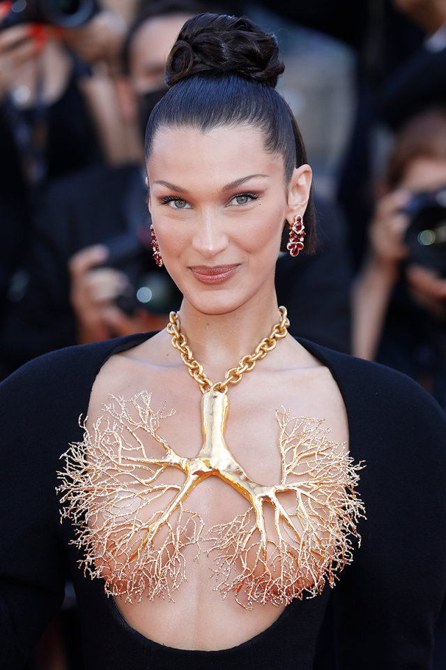 Bella Hadid Stuns In Golden Lung Necklace at 2021 Cannes Film Festival