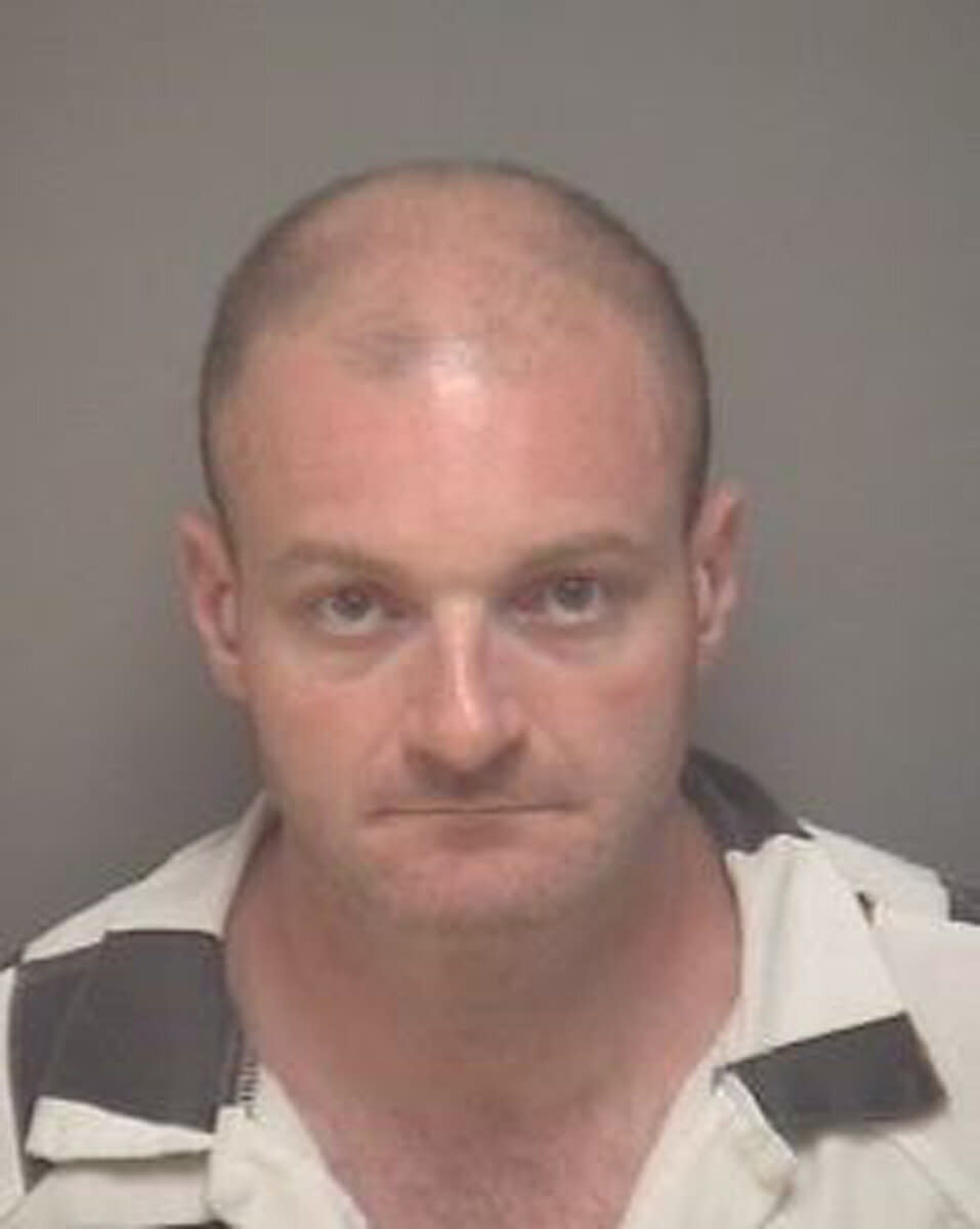 Christopher Cantwell following his surrender to police on Aug. 24, 2017. (Photo: Handout . / Reuters)