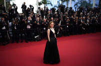 FILE - Julianne Moore poses for photographers upon arrival at the opening ceremony and the premiere of the film 'Final Cut' at the 75th international film festival, Cannes, southern France, Tuesday, May 17, 2021. Star power has been out in force at the 75th Cannes Film Festival. After a 2021 edition muted by the pandemic, this year's French Riviera spectacular has again seen throngs of onlookers screaming out "Tom!" "Julia!" and "Viola!" The wattage on display on Cannes' red carpet has been brighter this year thanks the presence of stars like Tom Cruise, Julia Roberts, Viola Davis, Anne Hathaway, Idris Elba and others. But as the first half of the French Riviera spectacular has shown, stardom in Cannes is global. Just as much as cameras have focused on Hollywood stars, they've been trained on the likes of India's Aishwarya Rai and South Korea's Lee Jung-jae. (AP Photo/Daniel Cole, File)