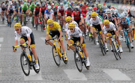 Cycling - The 104th Tour de France cycling race - The 103-km Stage 21 from Montgeron to Paris Champs-Elysees, France - July 23, 2017 - Team Sky rider and yellow jersey Chris Froome of Britain in action. REUTERS/Charles Platiau