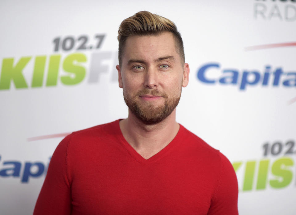 FILE - In this Dec. 1, 2017, file photo, Lance Bass arrives at Jingle Ball at The Forum in Inglewood, Calif. Bass turns 44 on May 4. (Photo by Richard Shotwell/Invision/AP, File)