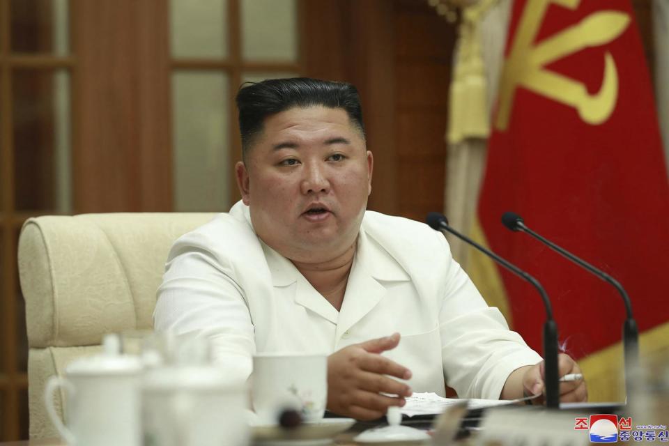 North Korean leader Kim Jong Un attends an enlarged meeting of the Politburo of the ruling Workers on Tuesday (AP)