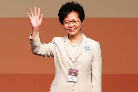 FILE PHOTO: Carrie Lam waves after she won the election for Hong Kong's Chief Executive in Hong Kong, China March 26, 2017. REUTERS/Bobby Yip