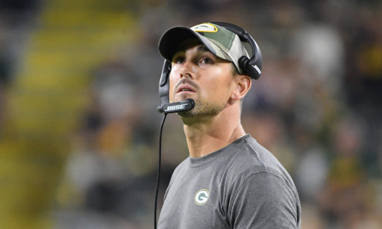 Matt LaFleur looks up from the sidelines in a Packers preseason game.