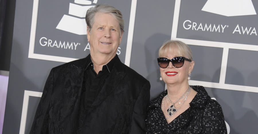 Musician Brian Wilson, left, and his wife Melinda Ledbetter Wilson arrive at the 55th annual Grammy Awards on Sunday, Feb. 10, 2013, in Los Angeles. A judge found Thursday that Beach Boys founder and music luminary Brian Wilson should be in a court conservatorship to manage his personal and medical decisions because of what his doctor calls a “major neurocognitive disorder.” (Photo by Jordan Strauss/Invision/AP, File)