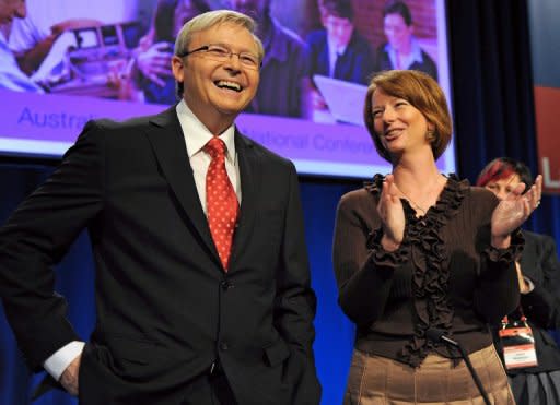 Former Australian leader Kevin Rudd has thrown his support behind the woman who ousted him, Julia Gillard (both seen here in 2009), to lead Labor at the next election, but only after repeated prompting