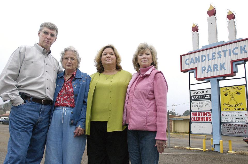 In this 2005 photo, Larry Swales stands with Pauline Pace, Pace's daughter Pam Pittman and Donna Durr (right), at historic Candlestick Park in south Jackson as they marked the 40th anniversary of a tornado that ripped through the shopping center. Swales (left), was working at Liberty Supermarket when the twister leveled the business. Pace was in the laundromat while her daughter Pam, who was 10 at the time, had run to the Dog-N-Suds across the parking lot to pick up food when the tornado hit. Both were buried under debris. Durr and her young son, traveling in a VW Bug were lifted 75 feet into the air and then gently placed on top of what was left of the shopping center.