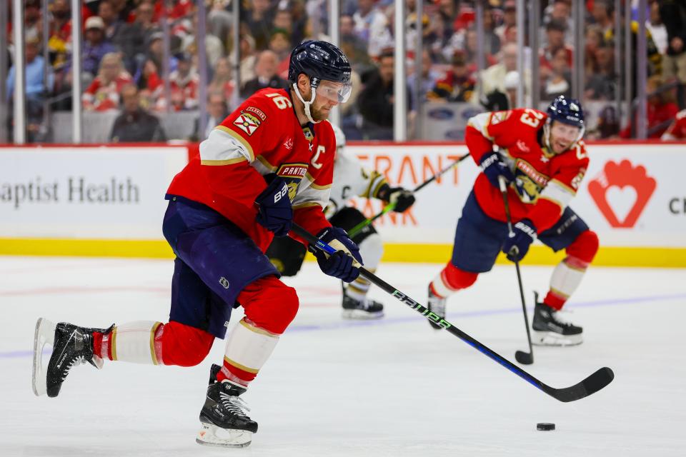 May 8, 2024; Sunrise, Florida, USA; Florida Panthers center Aleksander Barkov (16) moves the puck against the Boston Bruins during the third period in game two of the second round of the 2024 Stanley Cup Playoffs at Amerant Bank Arena. Mandatory Credit: Sam Navarro-USA TODAY Sports
