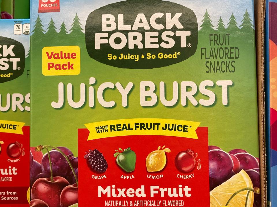 green box of black forest's juicy burst fruit snacks on shelf at aldi