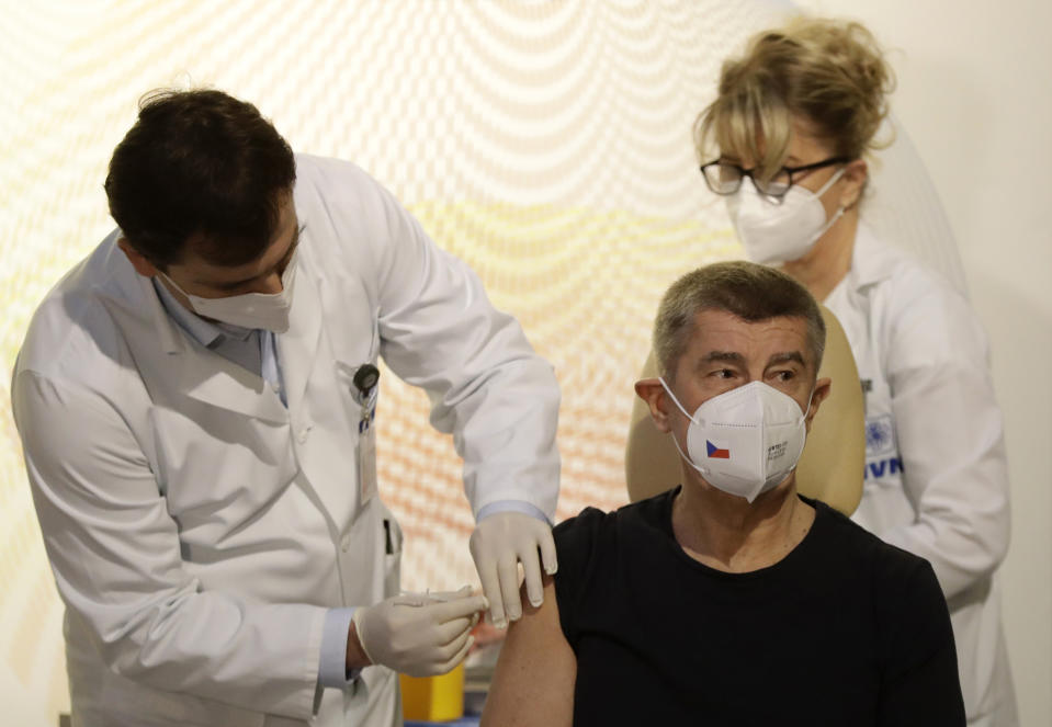 Czech Republic's Prime Minister Andrej Babis receives vaccine against COVID-19 at the military hospital in Prague, Czech Republic, Sunday, Dec. 27, 2020. (AP Photo/Petr David Josek)