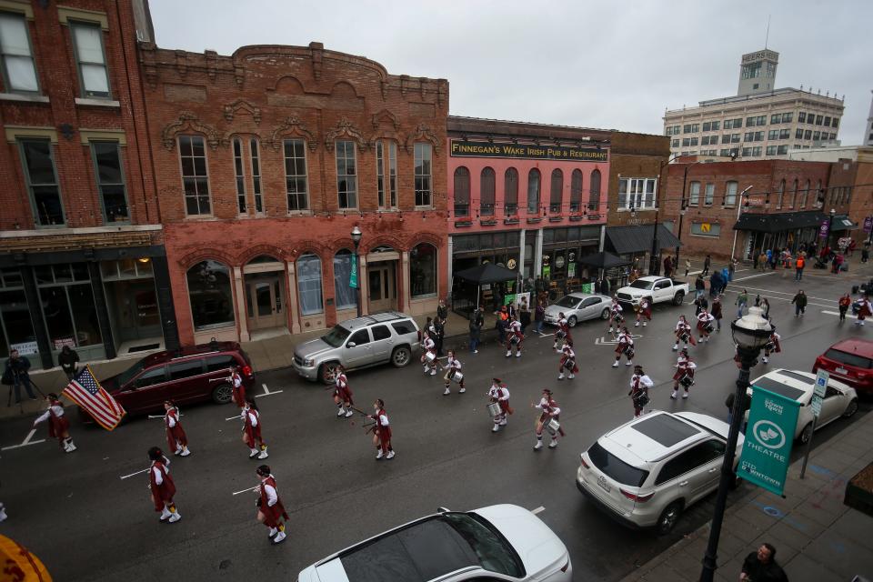 Community members enjoy the 40th annual Springfield Saint Patrick's Day Parade downtown on Saturday, March 11, 2023. This is the first year the parade has been held in Springfield since before the pandemic.