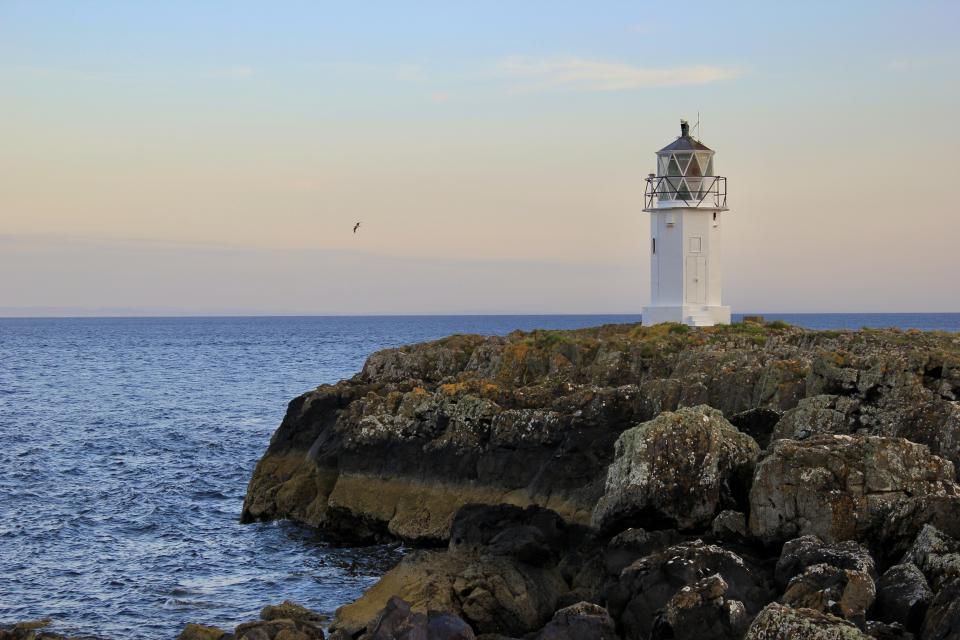 Rubh' an Eun lighthouse overlooking the Firth of Clyde - Isle of Bute, Scotland.