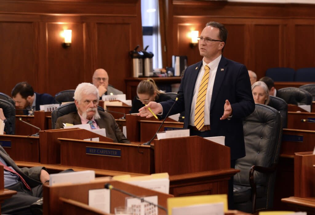 Legislators listen as Rep. Ben Carpenter, R-Nikiski and the author of House Joint Resolution 7, speaks in favor of the resolution to guarantee a Permanent Fund dividend, on Thursday, April 11, 2024. (Photo by James Brooks/Alaska Beacon)