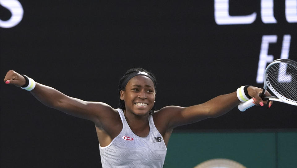 Coco Gauff of the U.S. celebrates after defeating Japan's Naomi Osaka in their third round singles match at the Australian Open tennis championship in Melbourne, Australia, Friday, Jan. 24, 2020. (AP Photo/Lee Jin-man)