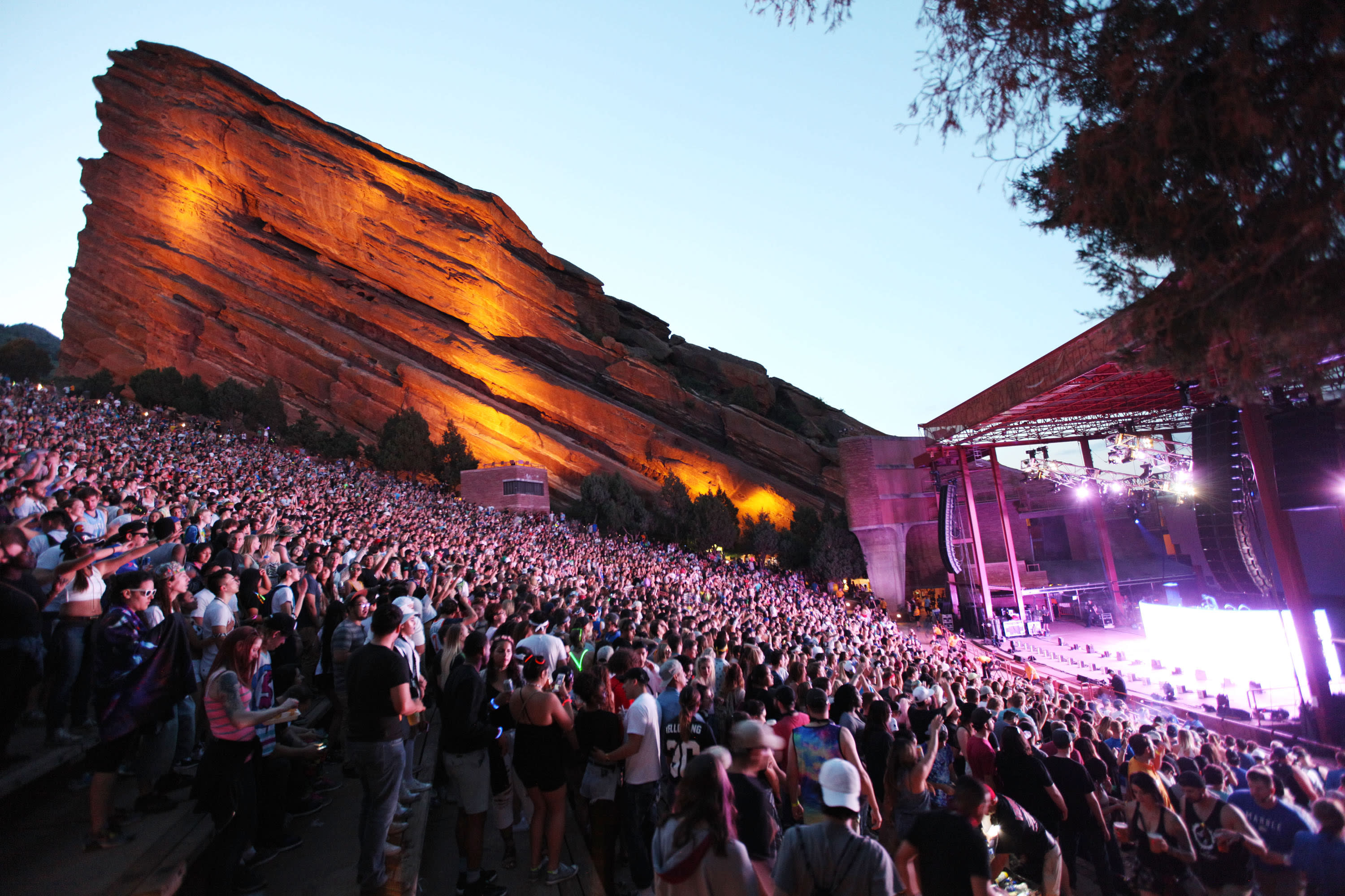 Fans shown at the Red Rocks venue.