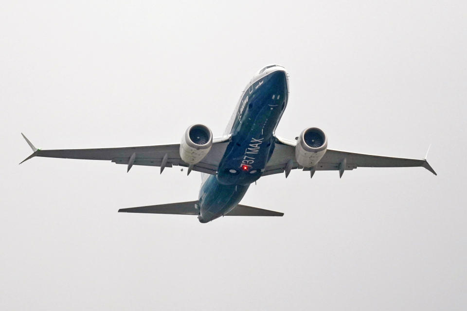 A Boeing 737 MAX jet, piloted by Federal Aviation Administration (FAA) chief Steve Dickson, takes off on a test flight from Boeing Field Wednesday, Sept. 30, 2020, in Seattle. The MAX was grounded worldwide in early March 2019 after the second of two fatal accidents that together killed 346 people aboard almost-new aircraft. (AP Photo/Elaine Thompson)