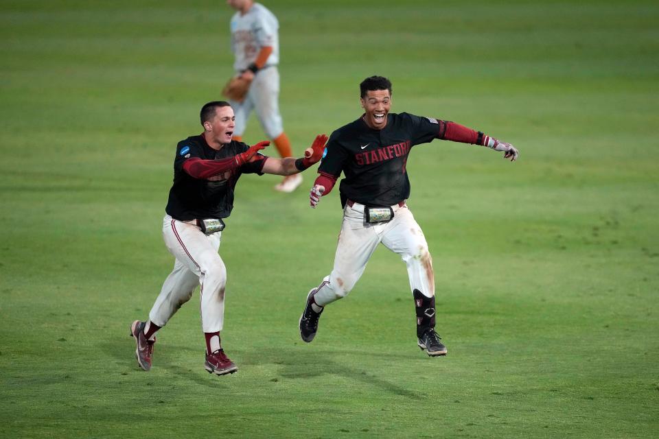 Stanford's Drew Bowser celebrates after hitting a game-winning single during the bottom of the ninth inning.