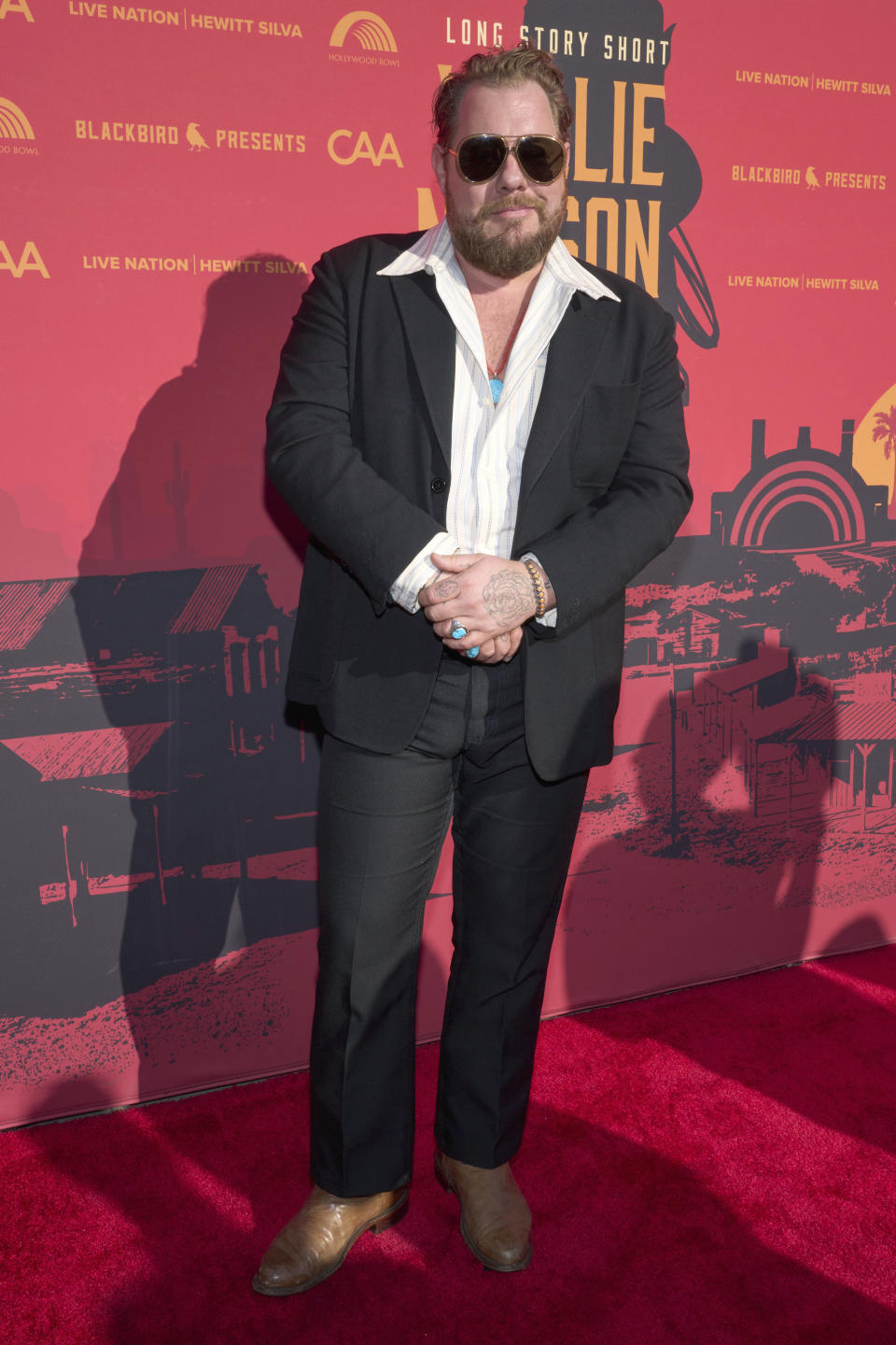 Nathaniel Rateliff arrives at Willie Nelson 90, celebrating the singer's 90th birthday, on Saturday, April 29, 2023, at the Hollywood Bowl in Los Angeles. (Photo by Allison Dinner/Invision/AP)