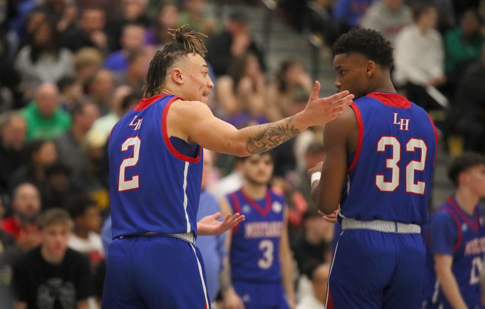 Laurel Highland's Rodney Gallagher (2) reacts after Antwan Black (32) missed a pass during the first half of the PIAA 4A Quarterfinals game against Lincoln Park Friday night at Hampton High School in Allison Park, PA.