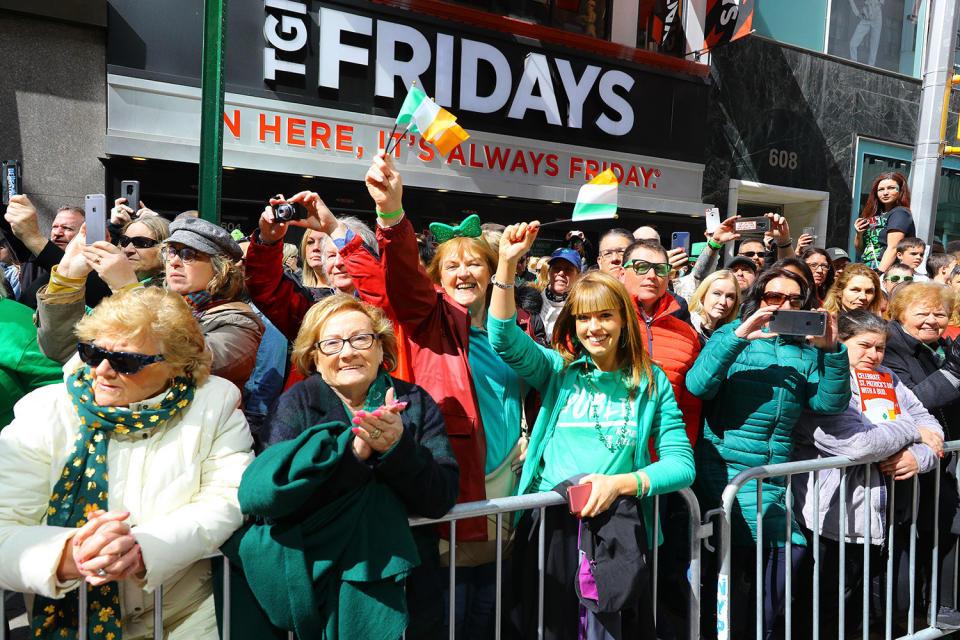 Crowds along Fifth Ave. are dressed fashionably green in clothing for the St. Patrick's Day Parade on March 16, 2019 in New York. (Photo: Gordon Donovan/Yahoo News)