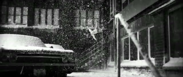 Nic falling to the street in the snow in "Antichrist"