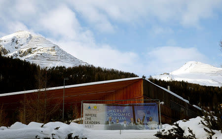 A banner of the World Economic Forum (WEF) is seen in front of the congress center in the Swiss mountain resort of Davos, Switzerland, January 11, 2018 REUTERS/Arnd Wiegmann