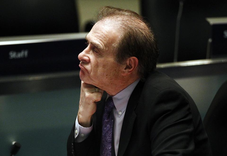 Toronto Deputy Mayor Norm Kelly attends a special council meeting at City Hall in Toronto November 18, 2013. Toronto's City Council voted overwhelmingly on Monday to limit further the powers of embattled Toronto Mayor Rob Ford, who denounced the move as a coup d'etat and warned political foes of an election battle next year to rival the Gulf War. Ford has been under fire after admitting to smoking crack cocaine, buying illegal drugs and driving after drinking alcohol. REUTERS/Aaron Harris (CANADA - Tags: POLITICS)