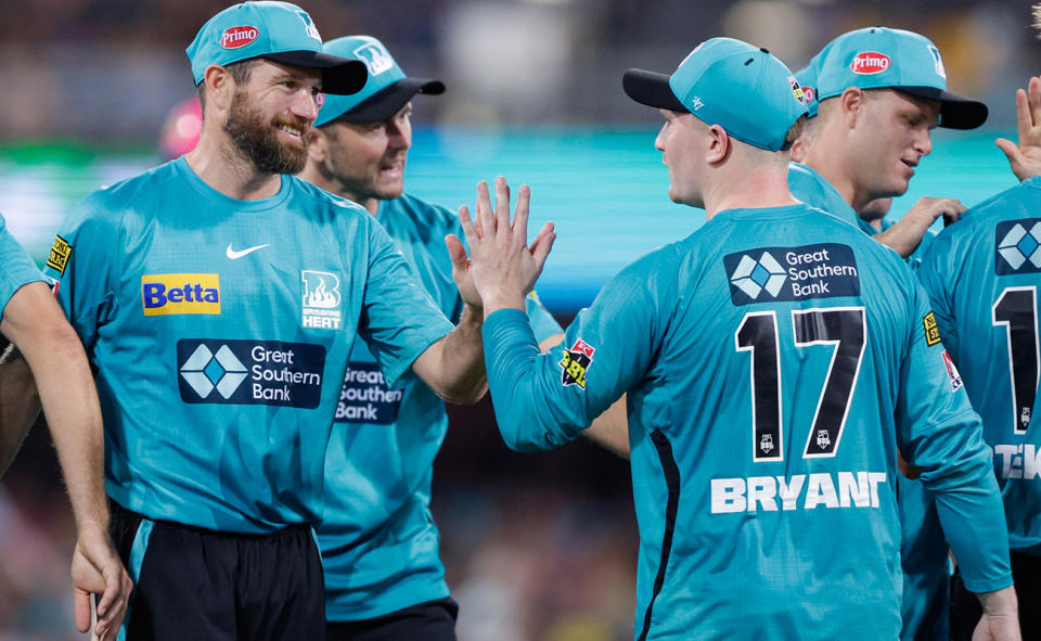 Brisbane Heat players, pictured here after Michael Neser's catch to dismiss Jordan Silk in the BBL.