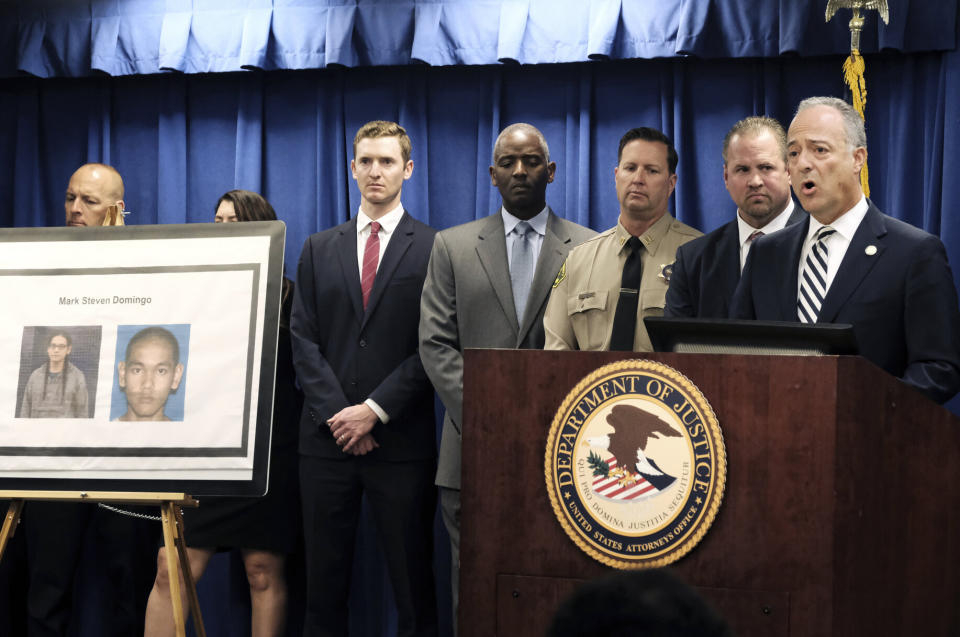 United States Attorney Nick Hanna, right, is joined by other law enforcement authorities during a news conference in Los Angeles to discuss the Mark Stevens Domingo arrest. (Photo: Richard Vogel/AP)