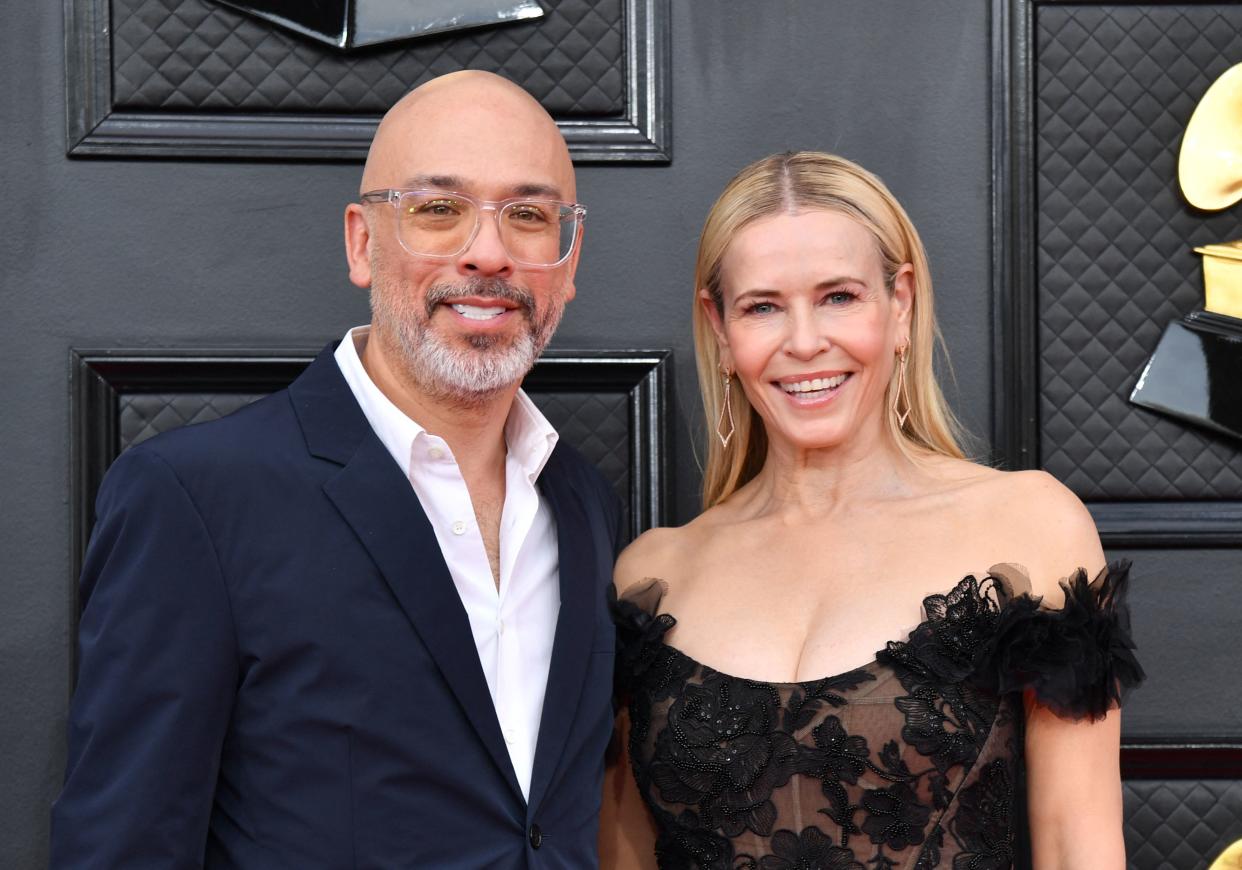US comedians Chelsea Handler and Jo Koy arrive for the 64th Annual Grammy Awards at the MGM Grand Garden Arena in Las Vegas on April 3, 2022. (Photo by ANGELA  WEISS / AFP) (Photo by ANGELA  WEISS/AFP via Getty Images)