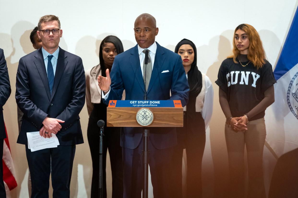 New York City Mayor Eric Adams (center) and New York City Administration for Children’s Services (ACS) Commissioner Jess Dannhauser (left) announce “College Choice,” a program that will provide college students in foster care with greater support systems, including financial support, so they can attend the college of their dreams without having to worry about the hefty price tag. City College, The Ballroom, Manhattan. New York on Tuesday, October 4, 2022.