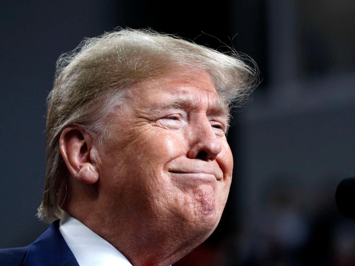 President Donald Trump smiles while speaking at a campaign rally in Ohio on Thursday: AP