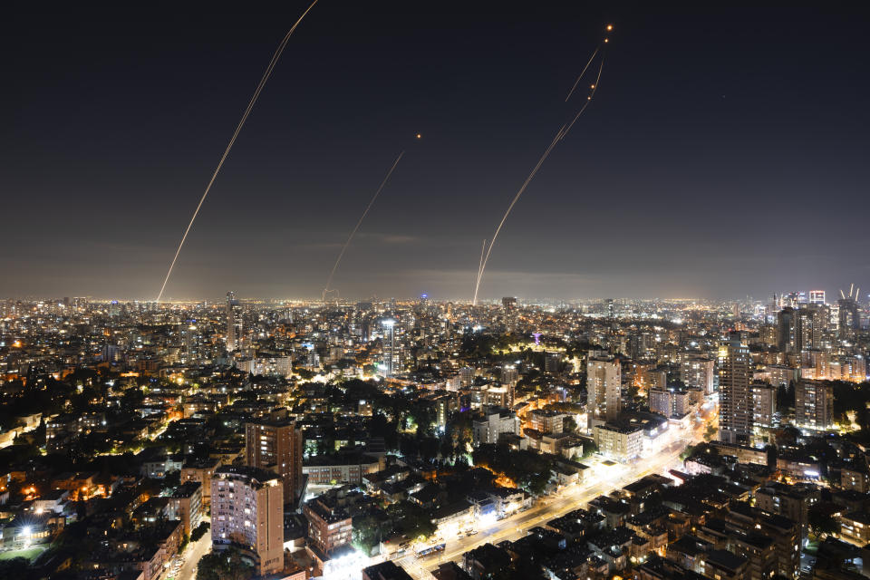 Israeli Iron Dome air defense system fires to intercept a rocket fired from the Gaza Strip, in central Israel, Sunday, Nov. 5, 2023. (AP Photo/Oded Balilty)