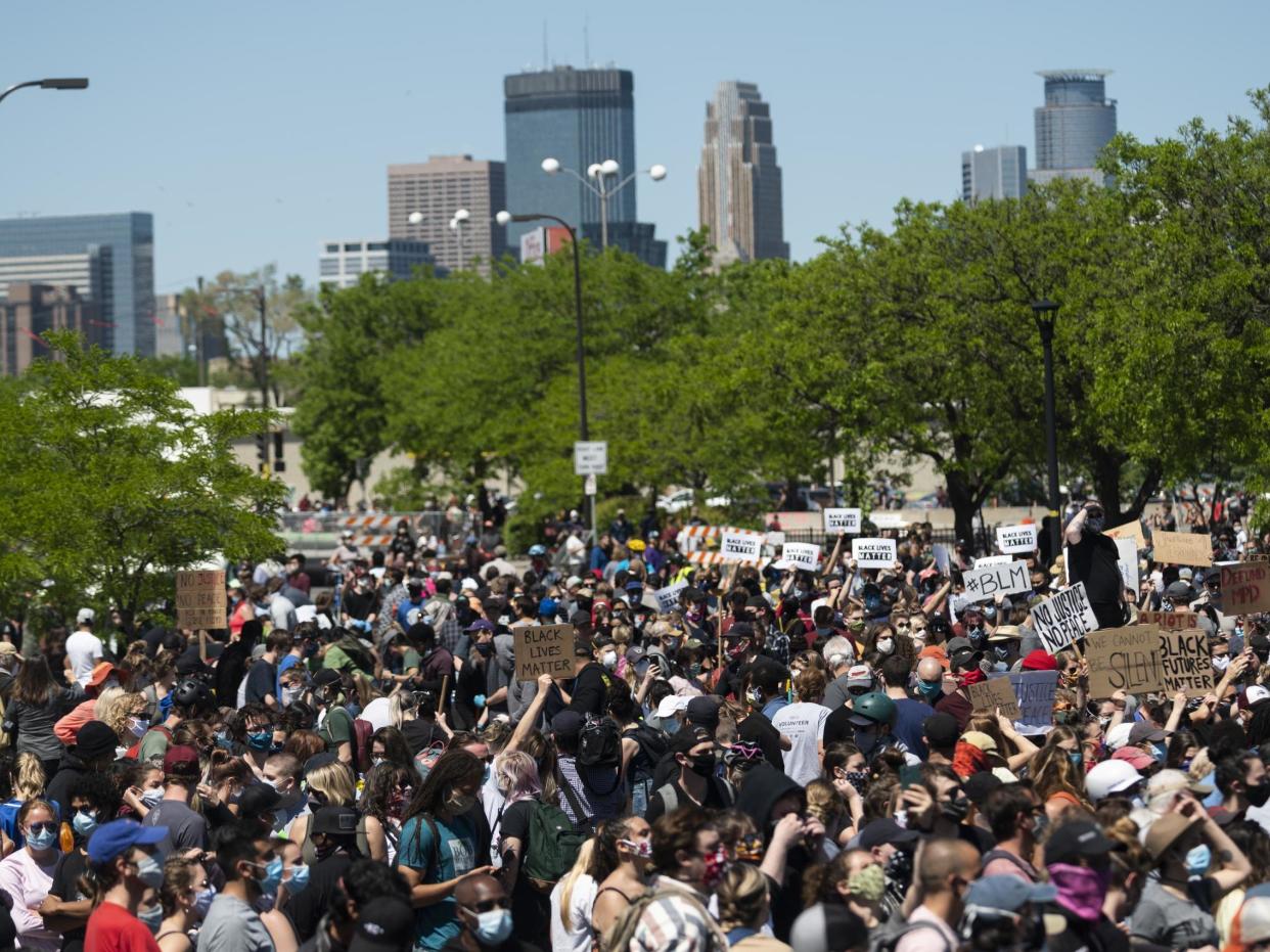 Protesters gather outside of the Fifth Police Precinct in Minneapolis, Minnesota on Saturday: Stephen Maturen/Getty Images