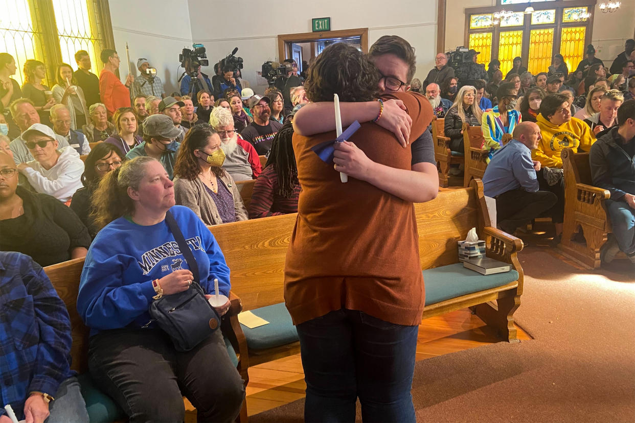 People gather for a vigil at All Souls Unitarian Universalist Church in Colorado Springs, Colo., on Nov. 20, 2022, following a mass shooting at Club Q, a gay nightclub. (Deon Hampton / NBC News)