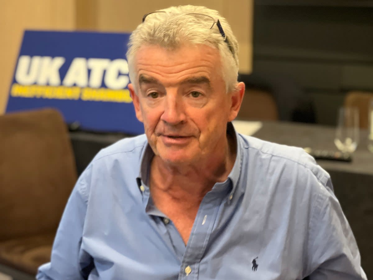 Michael O’Leary, chief executive of Ryanair, at a media event in London on 27 September 2023. The sign behind him reads “UK ATC: Inefficicent shambles” (Simon Calder)