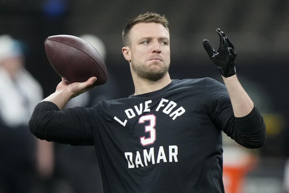 New Orleans Saints tight end Taysom Hill warms up wearing a T-shirt in support of Damar Hamlin before a game between the Carolina Panthers and the New Orleans Saints in New Orleans, Sunday, Jan. 8, 2023. | Gerald Herbert, Associated Press