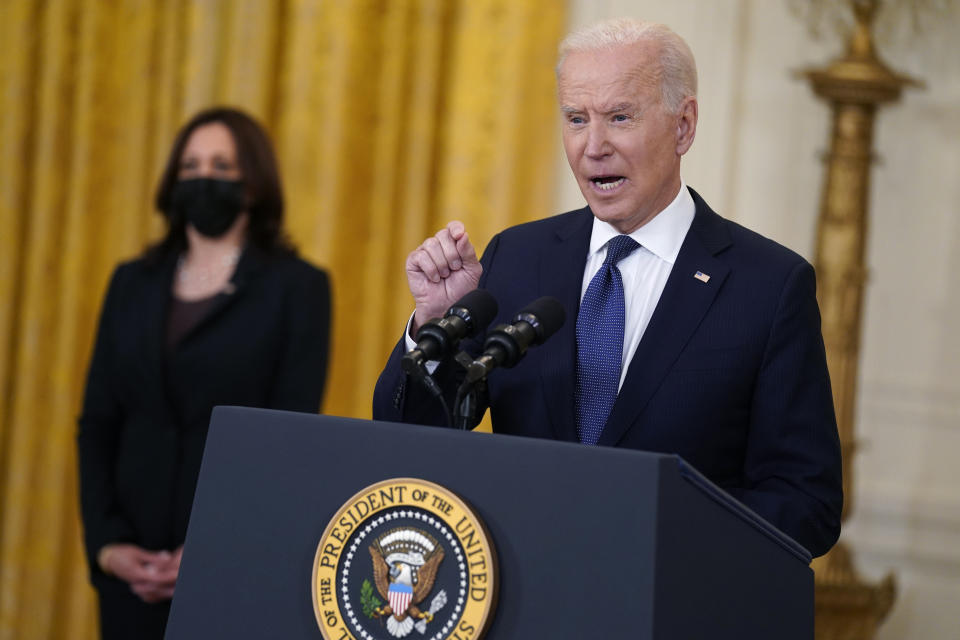 Vice President Kamala Harris listens as President Joe Biden speaks about the economy, in the East Room of the White House, Monday, May 10, 2021, in Washington. (AP Photo/Evan Vucci)