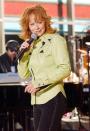 <p>We don’t know about you, but we need Reba’s 2005 pale green top and studded black jeans stat.</p>