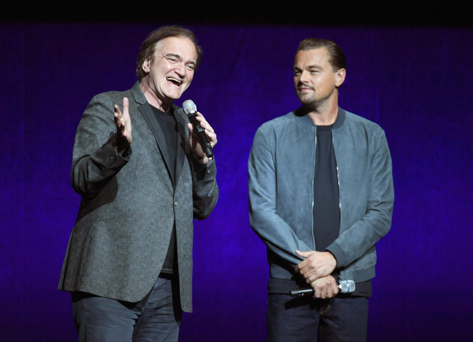 Director Quentin Tarantino and Leonardo DiCaprio speak onstage during the CinemaCon 2018